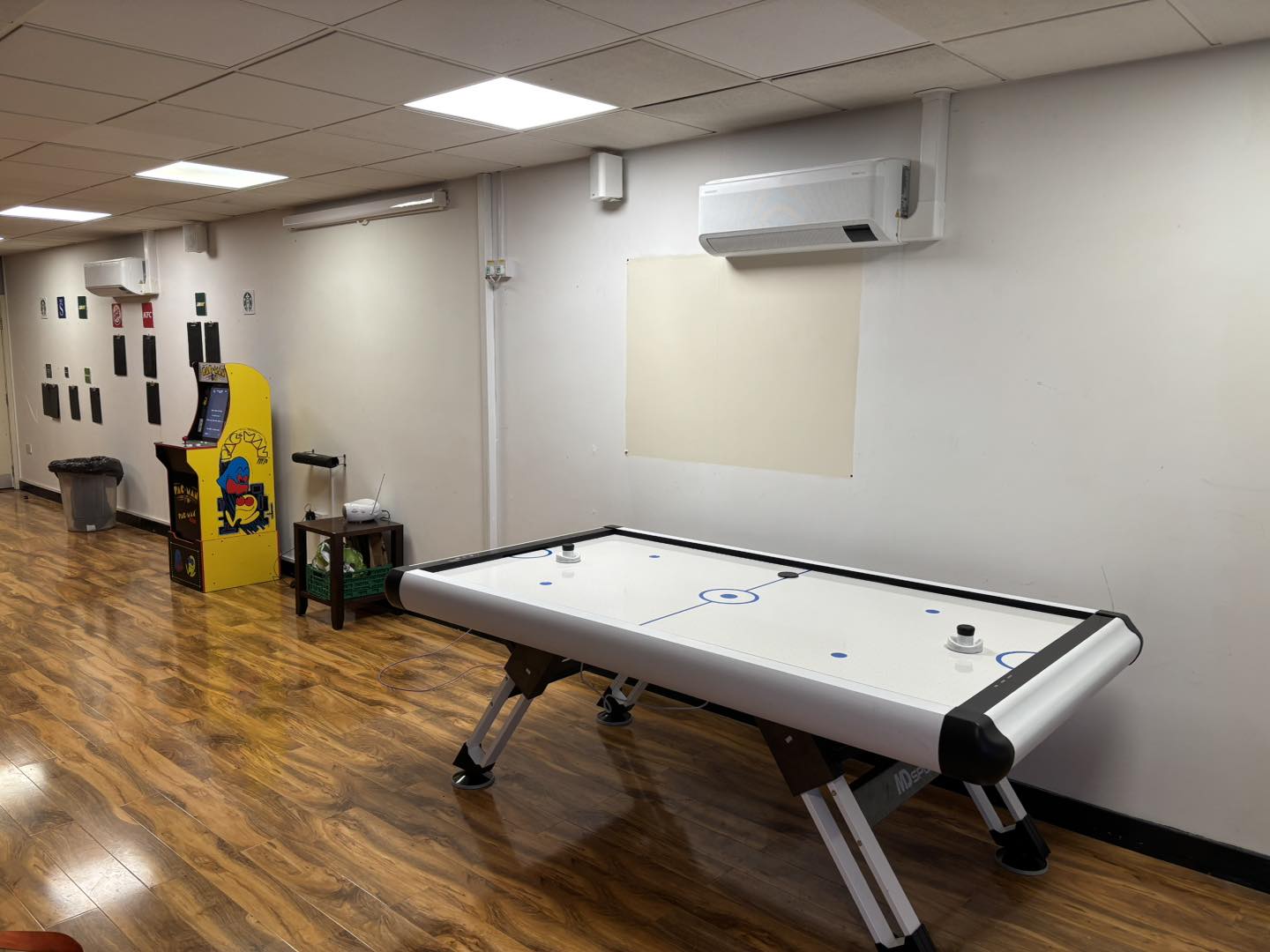 Air Hockey Table and Pac-Man arcade machine on hire in Leyland for a staff reward day