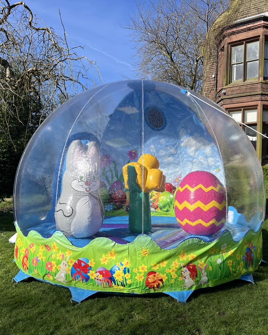 An image of a Easter themed inflatable globe on hire in Rainhill, Merseyside