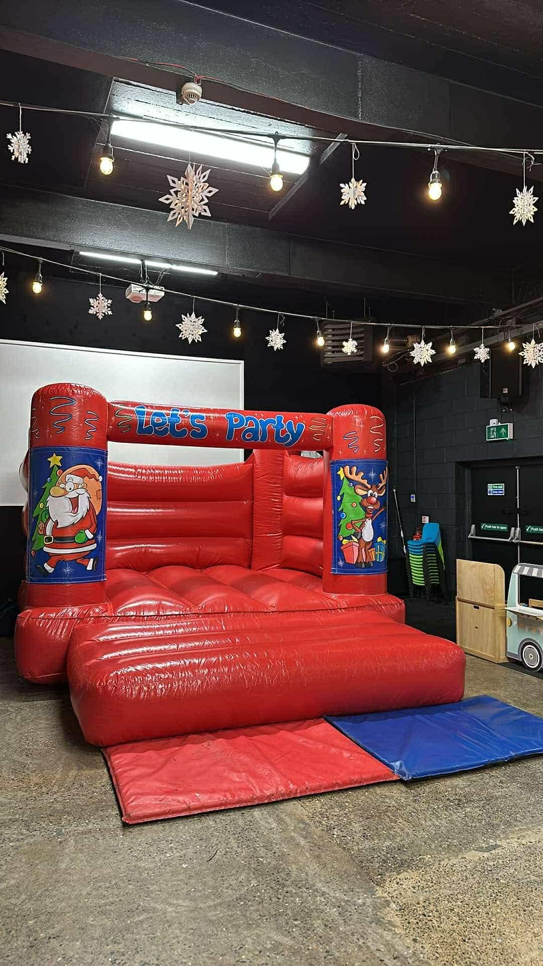 Christmas bouncy castle set up inside Liverpool One Church for Zoe's Place Christmas party