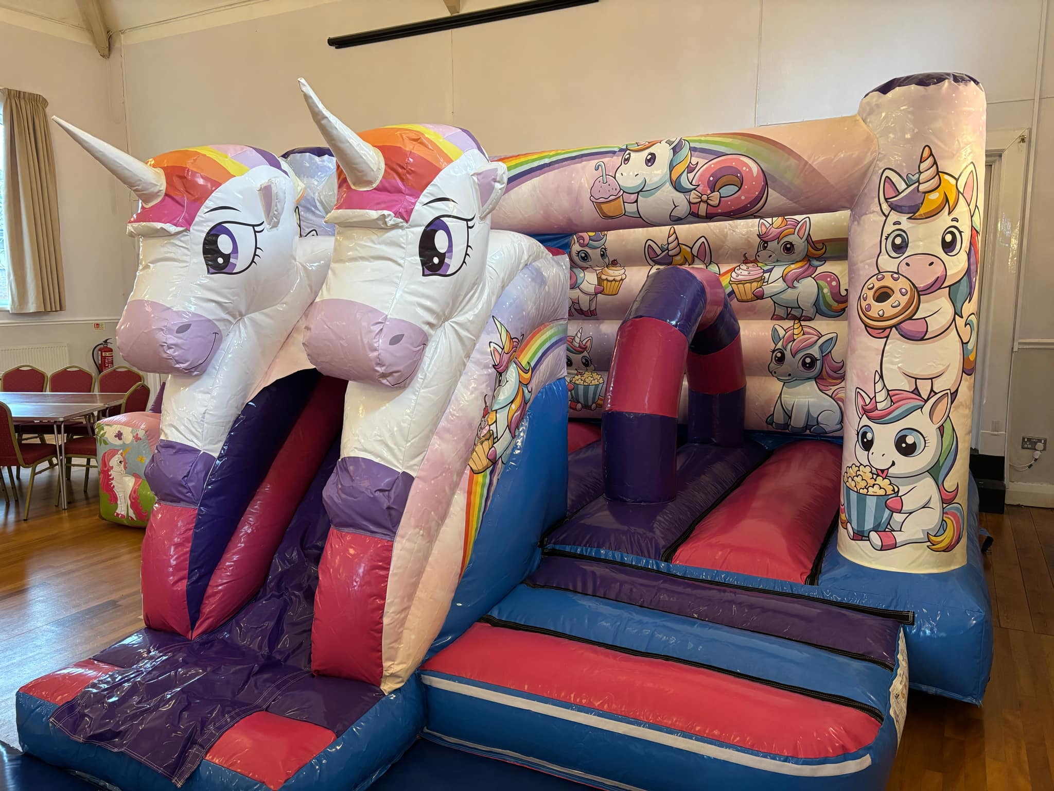 Indoor unicorn activity combo set up for a party at Rainford Village Hall